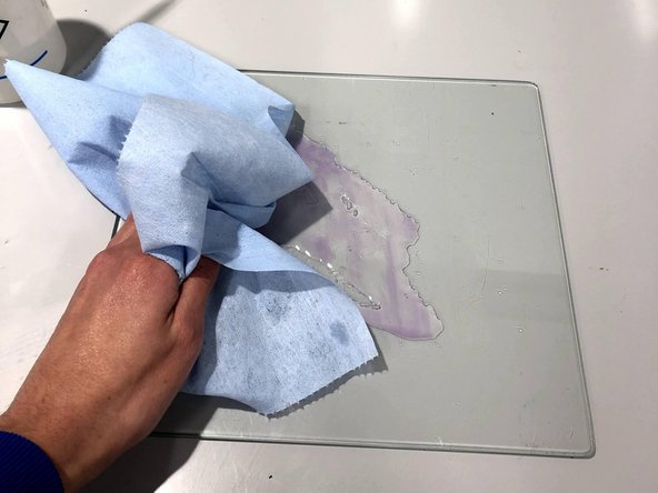 If Glue was used as build plate adhesion, use a water wash bottle to spray the build plate