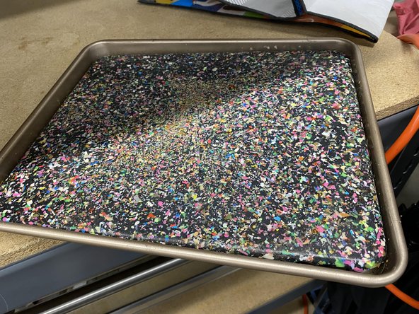 This may take some effort but be sure not to break or bend the PLA sheet.