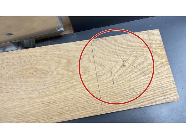 Using a straightedge or square, mark the workpiece with pencil to the desired cut length.