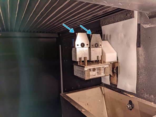 Lift straight UP and then move to the LEFT to remove the hood