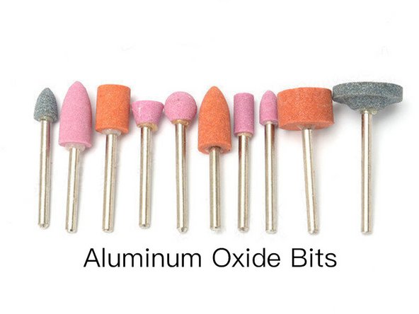 Generally, grinding bits are made of silicon carbide (green bits) or aluminum oxide (brown, orange, pink or gray bits). They come in a variety of shapes