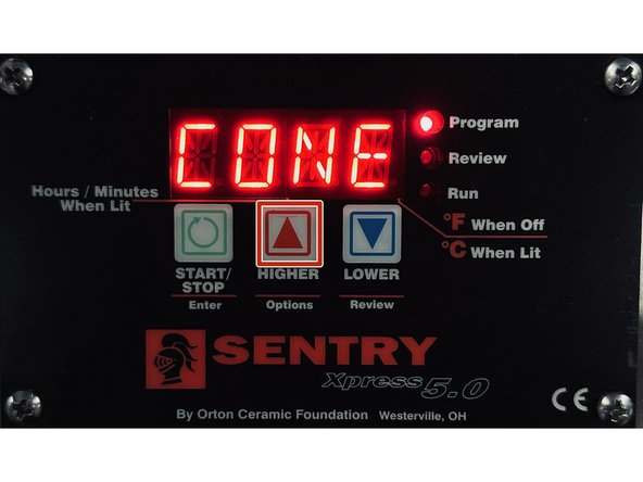Navigate using the RED button (HIGHER or Options) until the display says CONE.