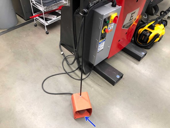 Take the pedal out and place it in front of the machine for use while you are able to see what you are doing.