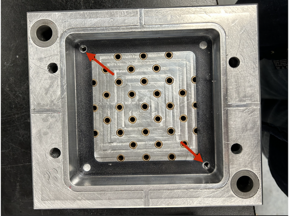 Insert the gasket into the pin side mud plate. Ensure that the holes line up for the pins if your gasket has pin holes, and that the threaded holes are free of any material.