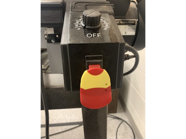 Flip large red switch underneath feed rate knob.