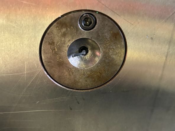 Issue: : Part of the sprue remains in the mold after injection.