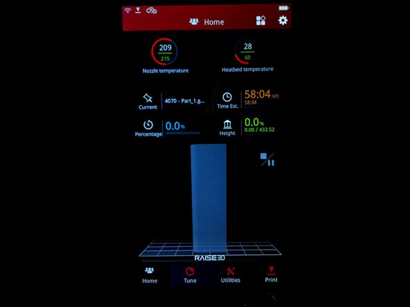 The print process begins by warming up the extruder and the build plate