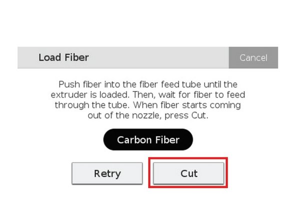 Once the fiber is extruding, press Cut