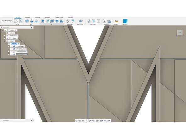 The 3 lines cutting the M in half shown in the picture were too small for Fusion to cut because they are smaller than the 1/8&quot; bit. We will have to manually select this lines and use 2D contours.