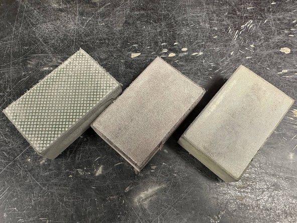 Resurfacing the roller requires 60, 200, and 400 grit diamond sanding blocks.