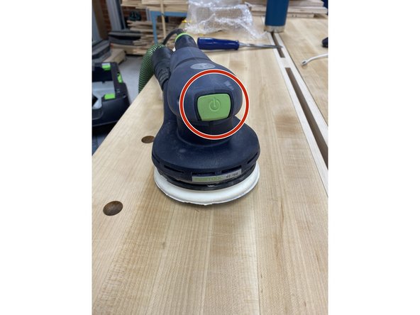 To turn it on, press the green button on the front.