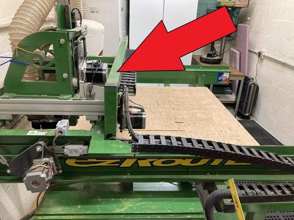 With the keyboard arrows move the spindle to the back corner exposing the router table. Secure your stock piece to the router table firmly
