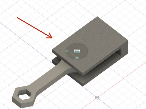 The joints made in the previous steps produced the assembly indicated with the red arrow.