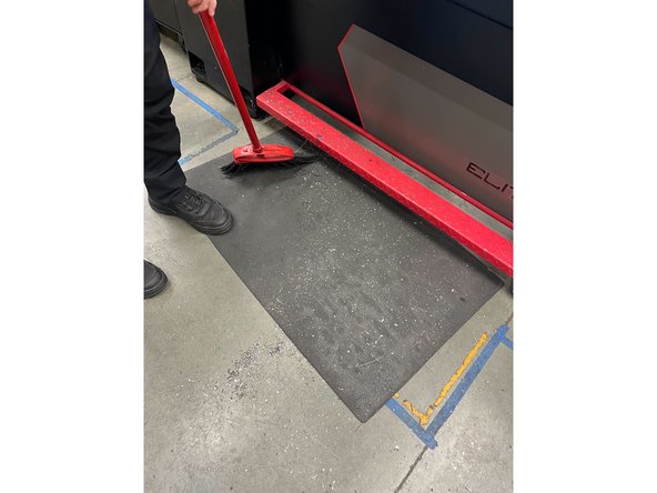 Use a broom and dustpan to sweet up any remaining chips in the area