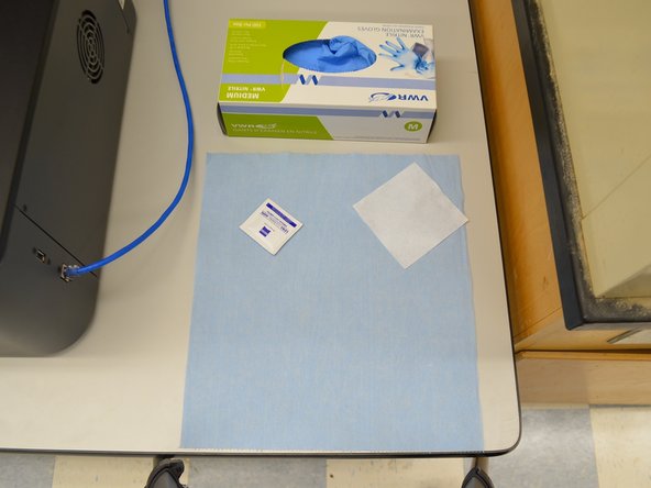 Do not touch the lens directly.