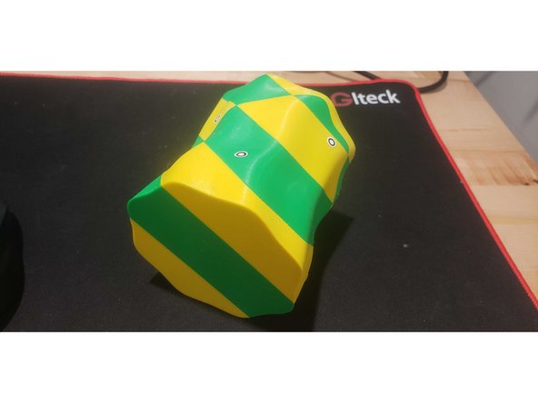 Turn the part upside down so that you can scan the bottom section of the base