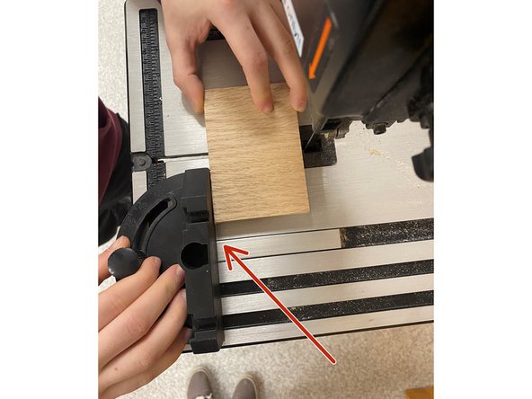 Please keep all hands and fingers clear of the blade while still containing control over the material.