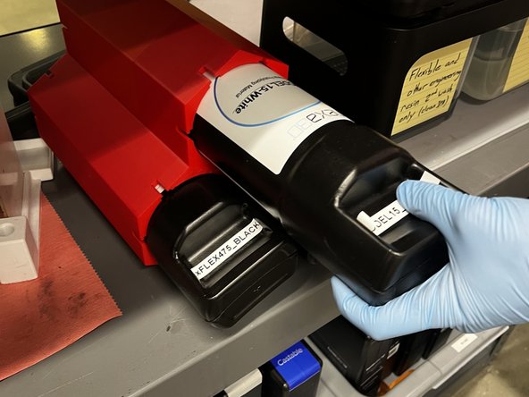 The metal 1kg canister is the older style, and it uses a special spout.