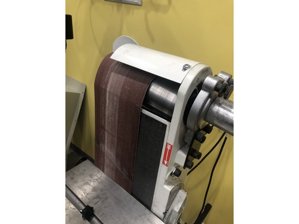 (Note: you have to hold down the handle and slide the belt off at the same time, if this proves to be difficult, call a friend to lend a hand!)