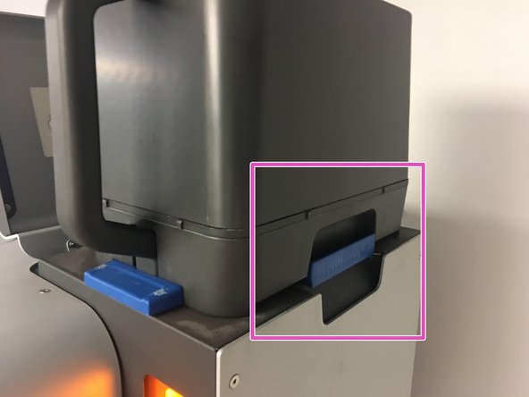 After the Powder Bin has been emptied, close the Bin securely