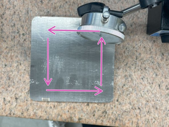 Line up the grinder with one edge of the plate. With the wheel spinning and coolant flowing make a pass to the other side of the plate, this should take 3-5 seconds to achieve an ideal surface quality.