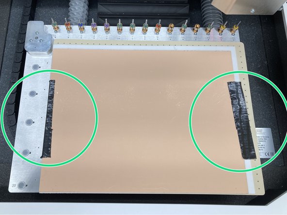 Tape the sides of the material down