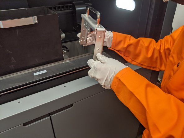 This locks the build plate into the bottom of the build box