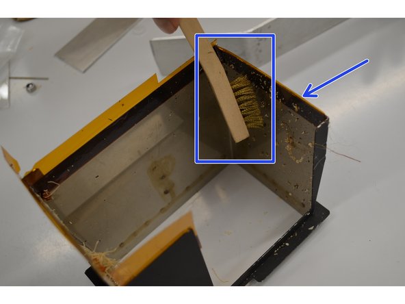 Remove the purge waste bucket by lifting the bucket and rotating it counter-clockwise. The contents can be put in the general lab waste