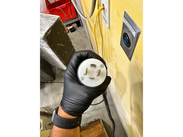 The plug has an odd shape so you'll need to make sure its aligned properly to the plug, with the bent prong going up and to the right. Turn the plug CW to lock it in place once it has been inserted into the outlet.