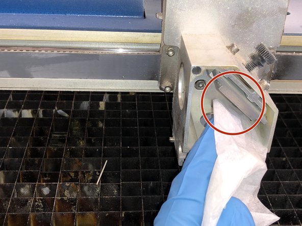 Gently wipe the mirror with lens paper