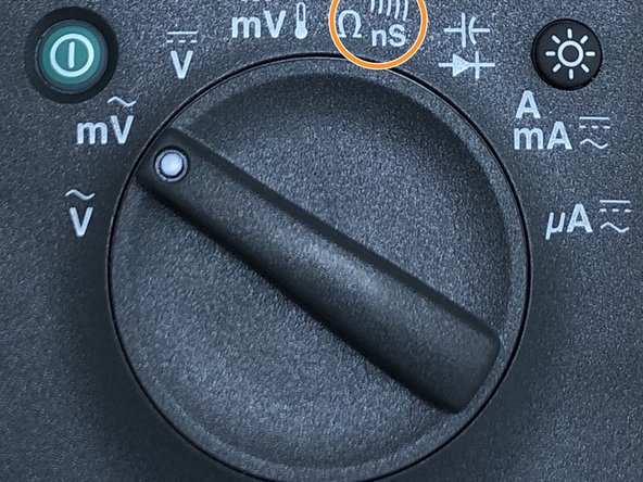 To measure conductance, position the rotary switch to the symbols shown in the image. Press the softkey labeled &quot;nS&quot;