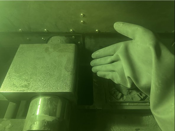 Before sanding, find the Roller with your hand. Insert your hand underneath the Carriage, and gently feel the underside of the Carriage until you feel the spinning Roller.