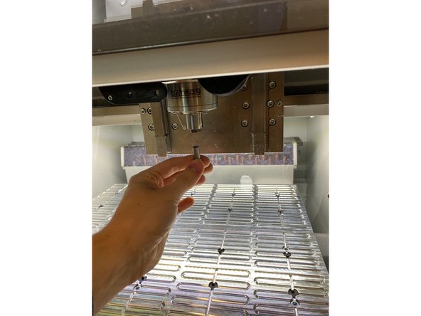 You can now remove the tool, and if you wanted to do a tool not from the spindle, you simply just pull it out of the magazine.