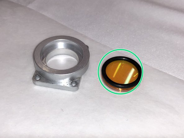 The lens can now be removed from its holder.