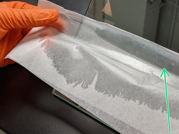 Start with a slow wipe from top to bottom to clean off any particles