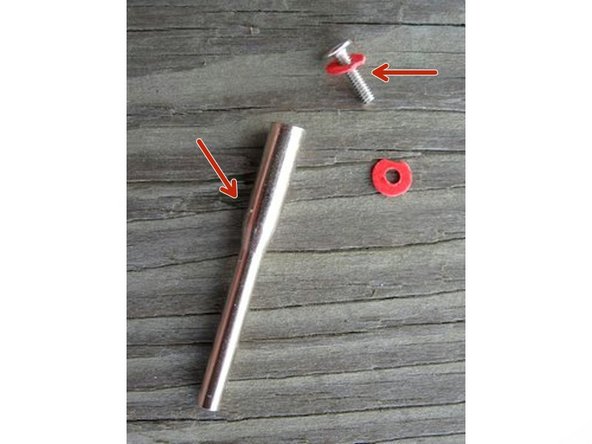 Wheels are attached to the mandrel (long metal rod) with a screw and washers or quick release mechanism