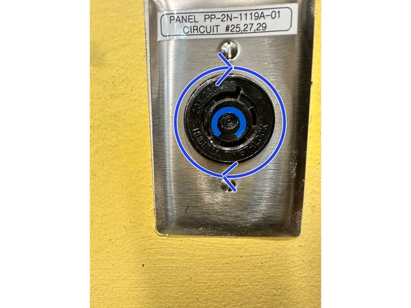 Once the machine is plugged in, you may power the grinder on by flipping the switch and pushing inward on the electrical panel.