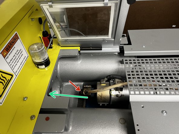 Move the plasticizing unit back by holding the unit back button until movement stops and the circle indicator turns yellow.