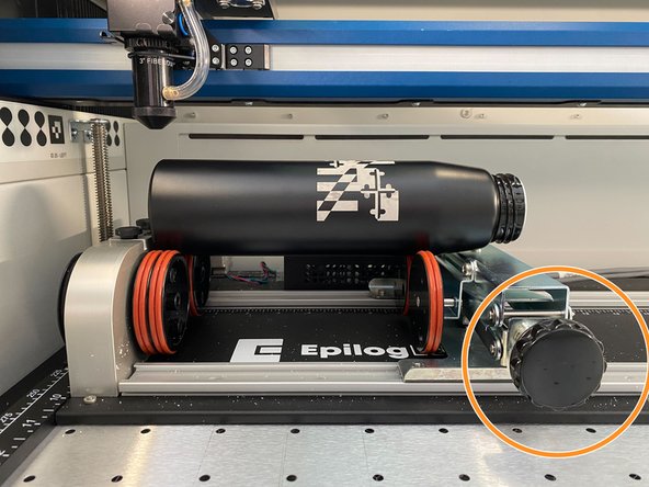 When engraving, it is important to have a flat surface. To achieve this, rotate the knob to lift or lower the scissor jack until the piece is properly leveled.