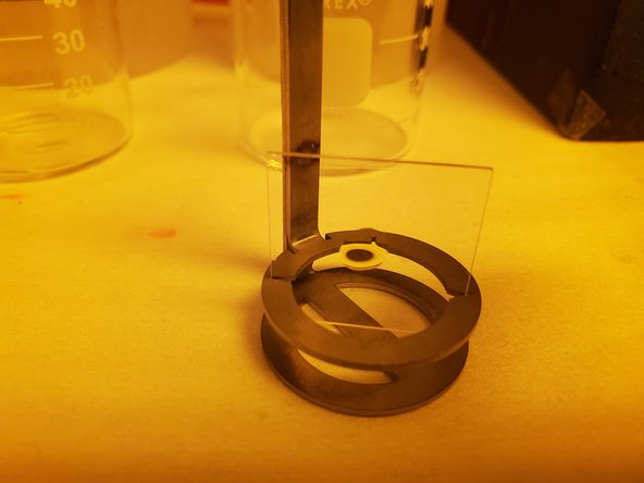 Remove the tape from the slide.