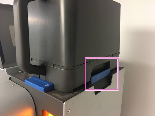 Open the Powder Bin by pulling the blue handle to the right, and let the powder fall into the Fuse Hopper