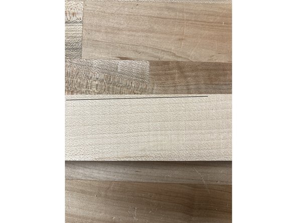 A paring cut is for taking off very small amounts of material, usually when shaving down a joint for a perfect fit. Hold the chisel almost flat against the wood, and just use the force from your hand (no mallet).