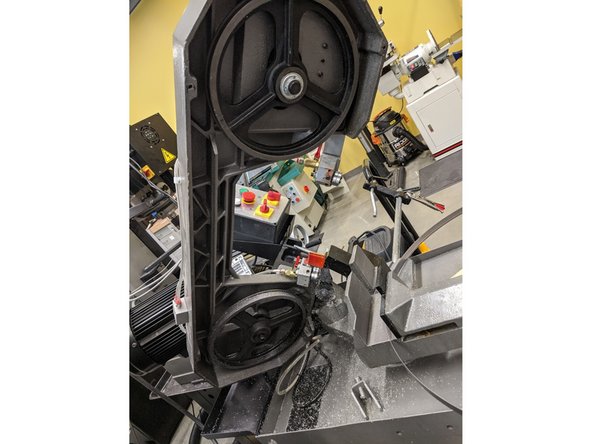 Wearing hand gloves, carefully install a new blade keeping in mind the blade direction.