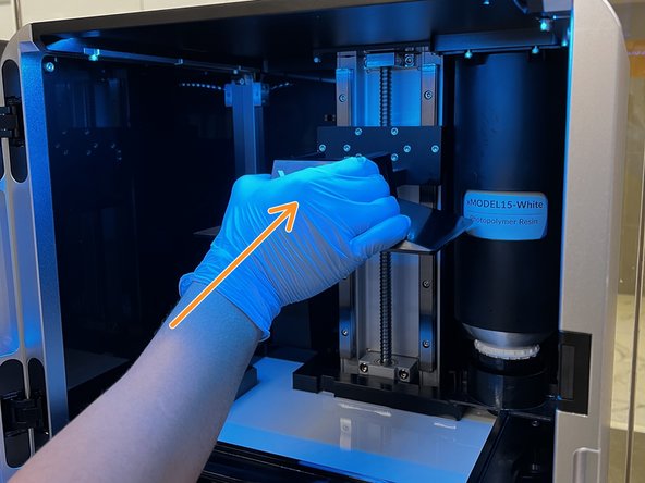 Slide the build plate back into the printer.