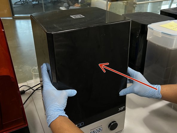 Place the UV cover on top of the Wash+Cure.