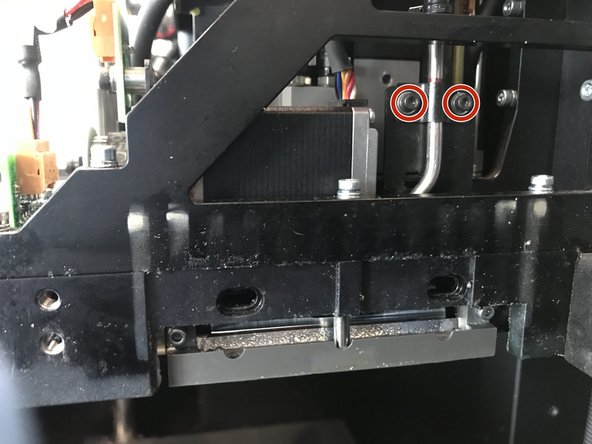 Loosen both screws holding the &quot;straw&quot;