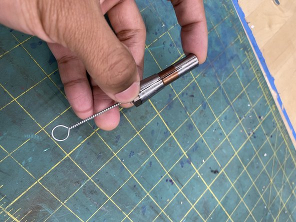 Using the cleaning brushes clean the collet chuck of any dirt, debris, and caked-on grease.