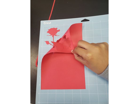 Once the cut is finished, remove the mat from the Cricut by pressing the load/unload button again.