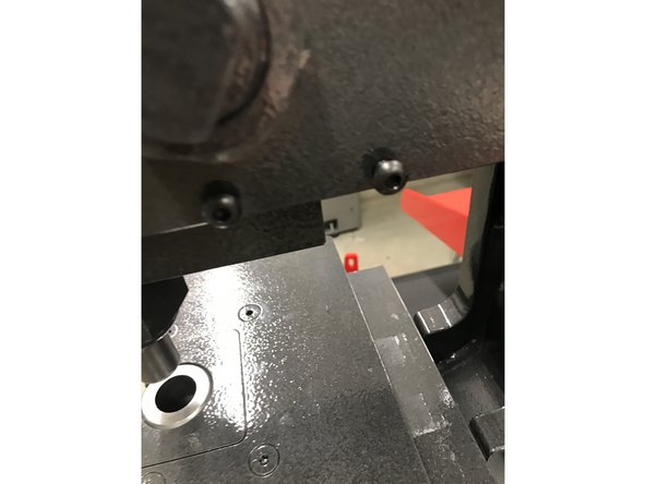 Use the 9/64th T handle to remove the screws and then tighten the guard back into place.