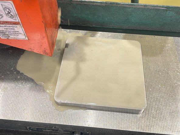 Affix the rod by flipping the lever attached to the magnetic clamp.